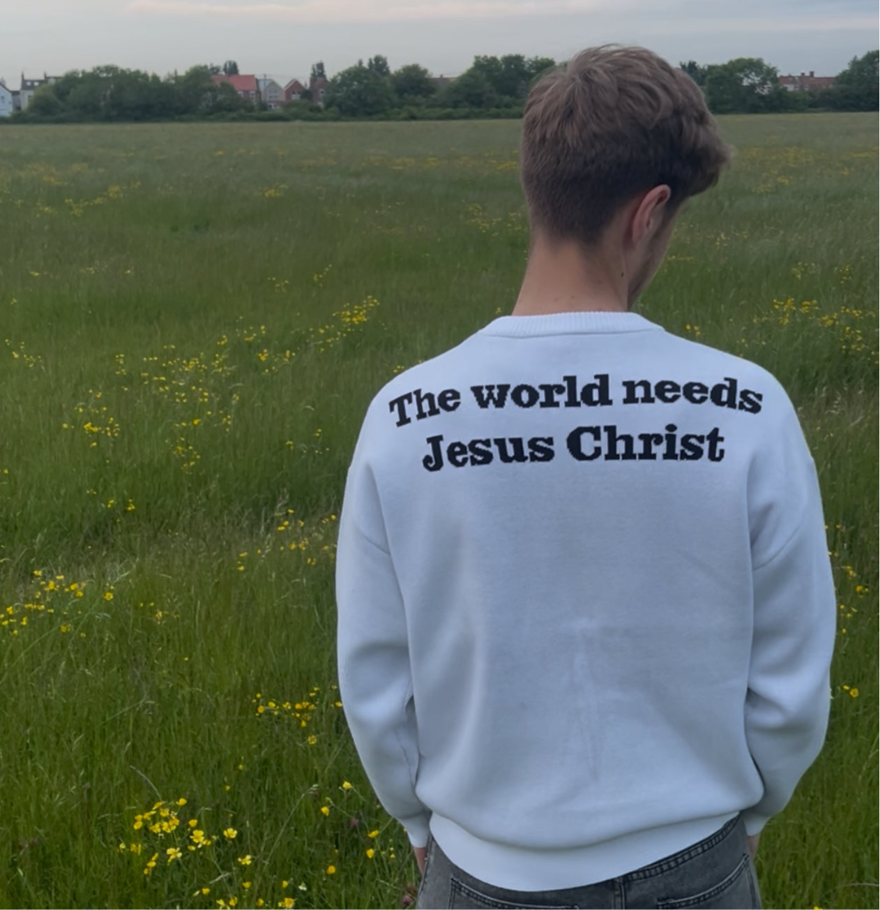 "THE WORLD NEEDS JESUS CHRIST" KNIT WHITE SWEATER